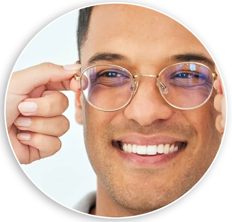 Patient wearing glasses after successful eye treatment at Sahu Eye Hospital